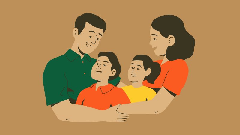 A Family of Four, Smiling and Embracing, Representing Togetherness and Unity